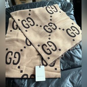 GUCCI
Beige & Brown Wool GG Scarf